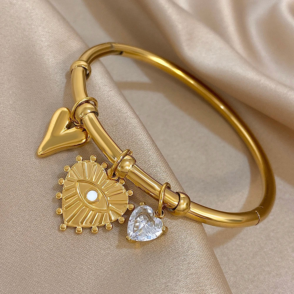 سوار أنيق من الفولاذ المقاوم للصدأ للنساء مطلي بالذهب على شكل قلب من الزركون وعين الشيطان مع أساور مجوهرات هدايا
