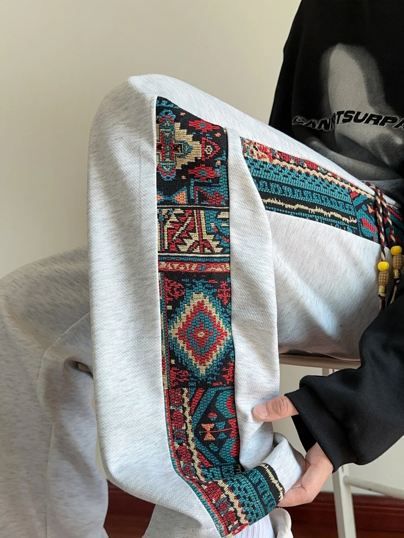 Men's spring and autumn casual pants, with ethnic style splicing design, suitable for outdoor leisure in spring and autumn