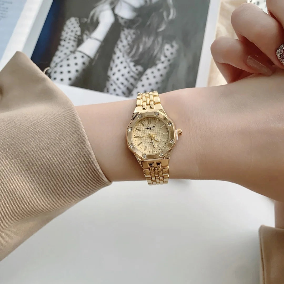 ساعة يد نسائية فاخرة بتصميم دائري، سوار من الفولاذ الذهبي، تعمل بالكوارتز، ساعة يد ذهبية أنيقة للنساء.