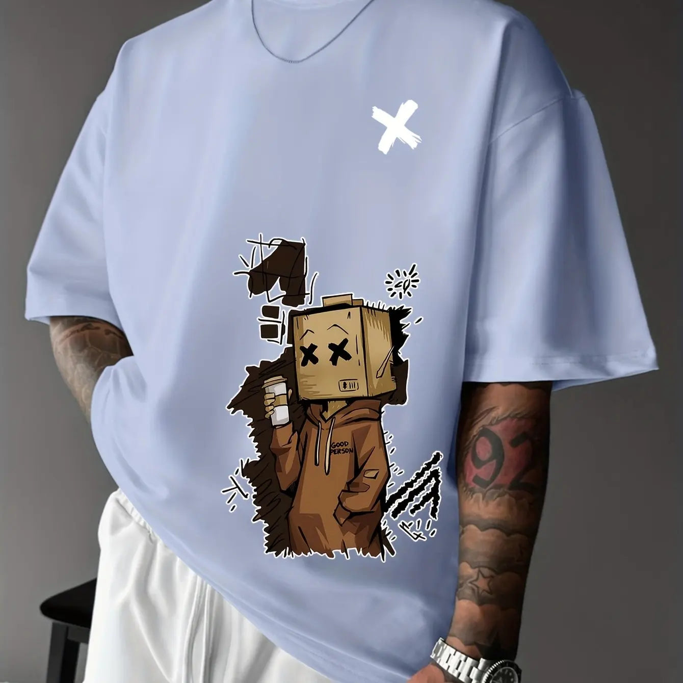 تيشيرت رجالي عصري فضفاض مطبوع عليه رسومات جرافيتي على شكل دمية، مصنوع من القطن الخالص 100%، بياقة دائرية وأكمام قصيرة.