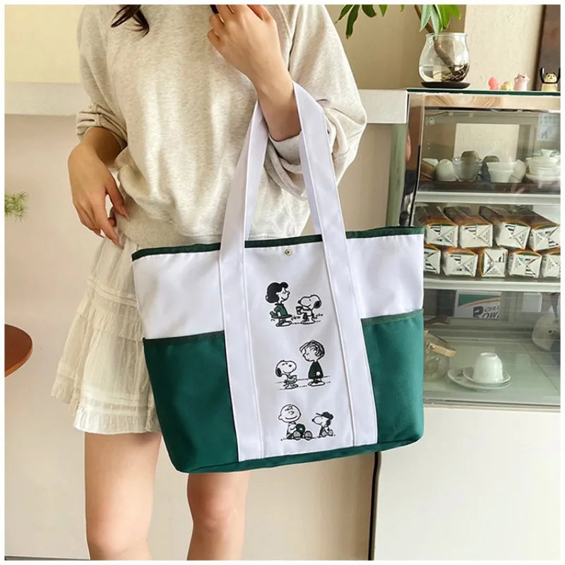 حقيبة قماشية كاجوال كبيرة الحجم مطبوعة عليها صورة سنوبي كرتونية جديدة من MINISO، حقيبة يد عصرية للطلاب بكتف واحد