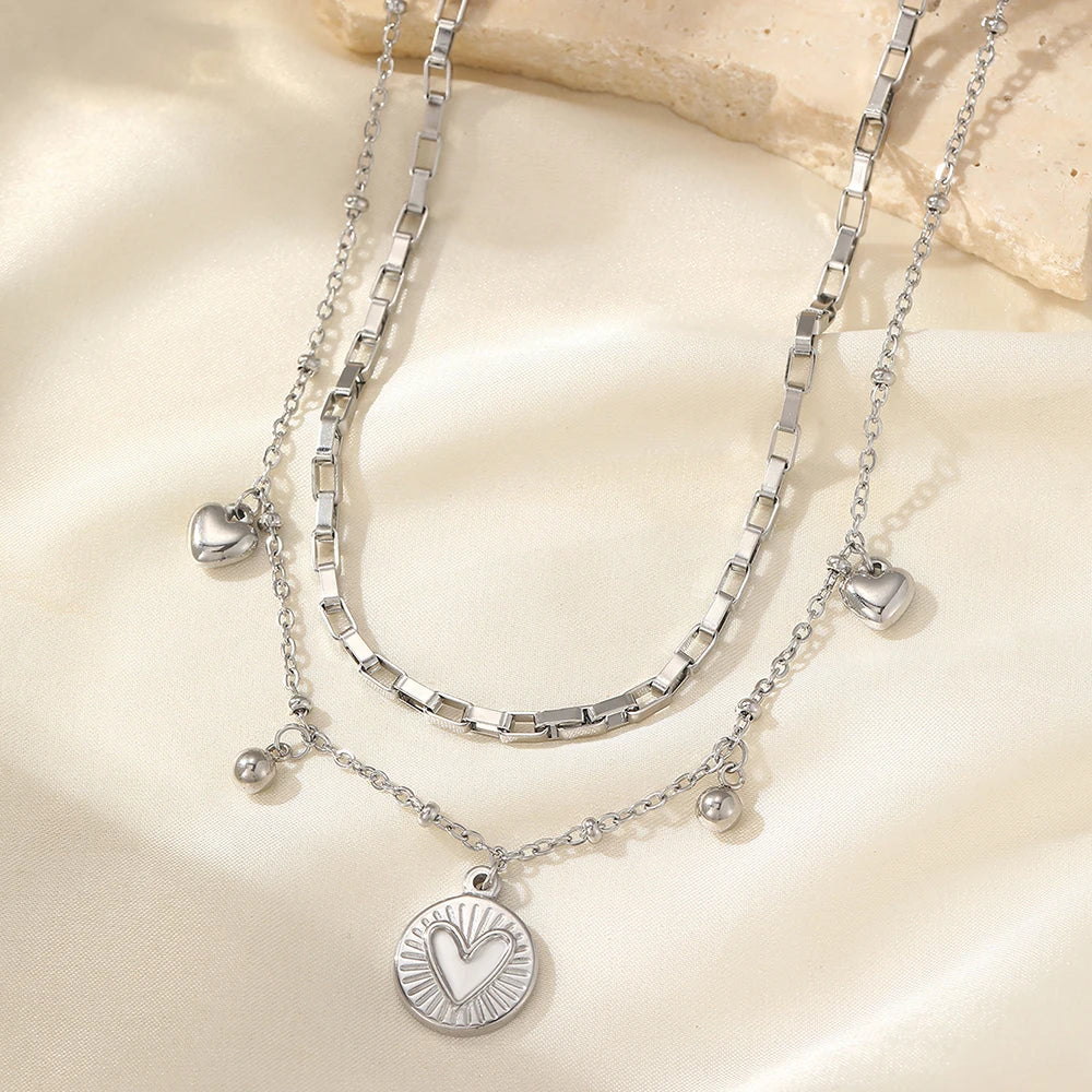 قلادة من الفولاذ المقاوم للصدأ من وويوي، فاخرة ورائعة، بتصميم قلب خوخي مزدوج الطبقات، وسلسلة عظمية، هدية مثالية للسيدات في أعياد الميلاد والذكرى السنوية.