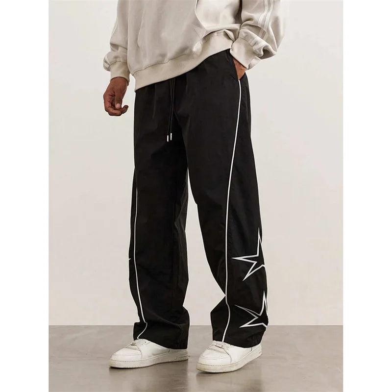 2025 Spring Autumn New Men’s pure color Casual Embroidered Drawstring Pants Men fashion Loose quick-drying Leg Straight Pants