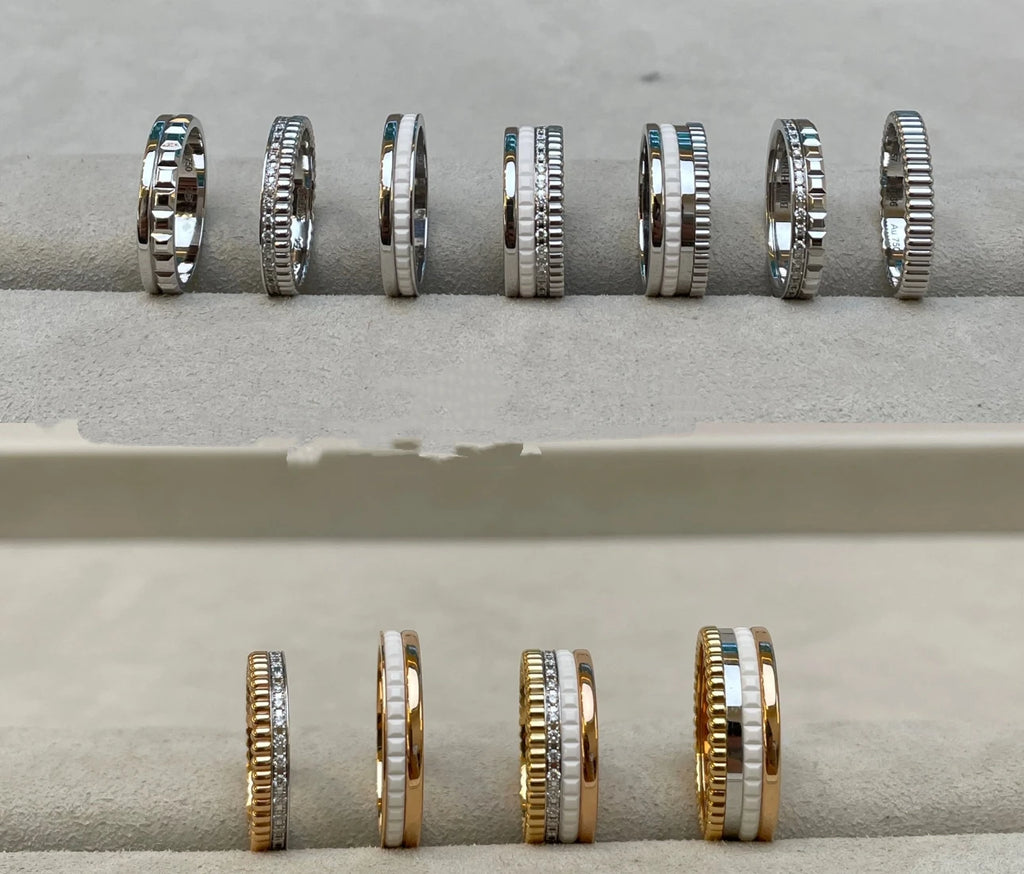 خواتم دوارة فاخرة على الطراز الفرنسي للرجال والنساء قابلة للدوران مصنوعة من مادة الموزانيت عالية الجودة باللونين الأسود والأبيض هدية للمهرجانات