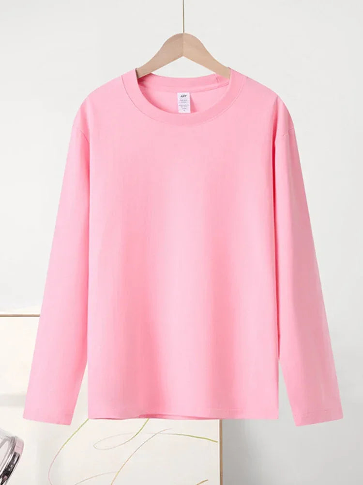 تي شيرت ستريم جيرل بأكمام طويلة للنساء مصنوع من القطن بنسبة 100%، تي شيرتات أساسية سادة برقبة دائرية، تي شيرتات فضفاضة كاجوال، تي شيرتات بيضاء للسيدات 2024